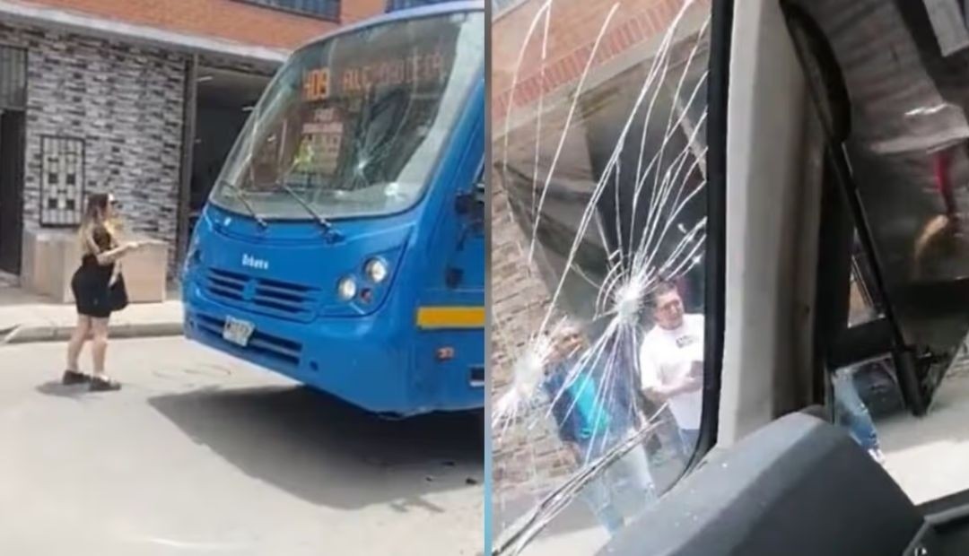 Mujer furiosa ataca con martillo a un bus del SITP