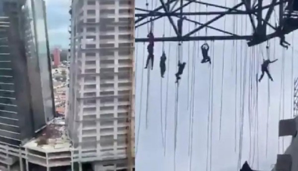 Obreros suspendidos a 140 metros tras colapso de andamio