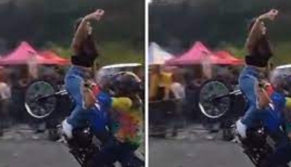 ¡Imprudencia! Mujer cae de una moto en una competencia de piques y piruetas