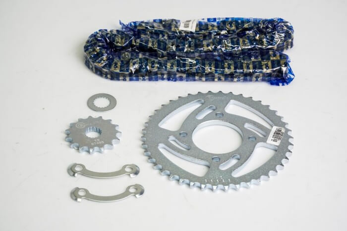 KIT CAJA CADENA - OWEN NUEVA 125 4 HUECOS (PT42C-PD15C-428-H-124-C) DORADA CASSARELLA